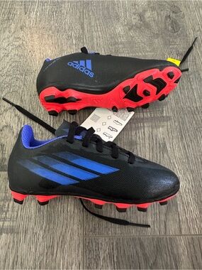 Brand new in box Adidas X Speedflow.4 FxG J cleats in youth size 11.5K (EU 29)